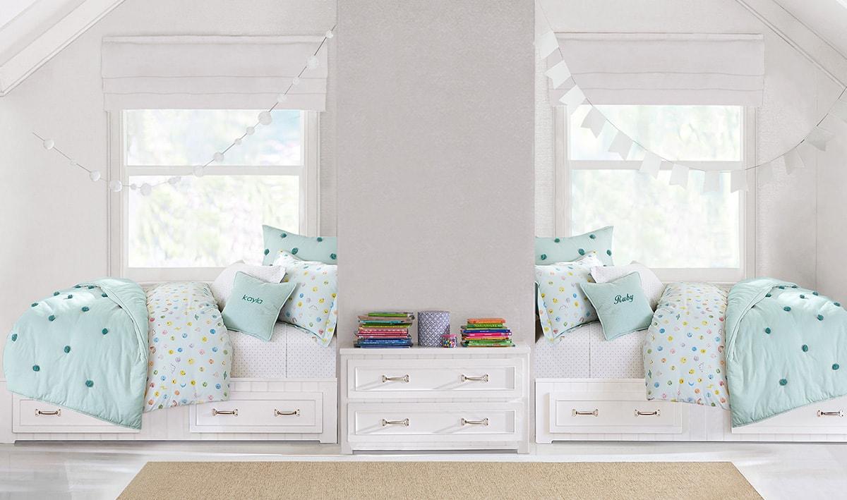Two beds in a farmhouse style bedroom